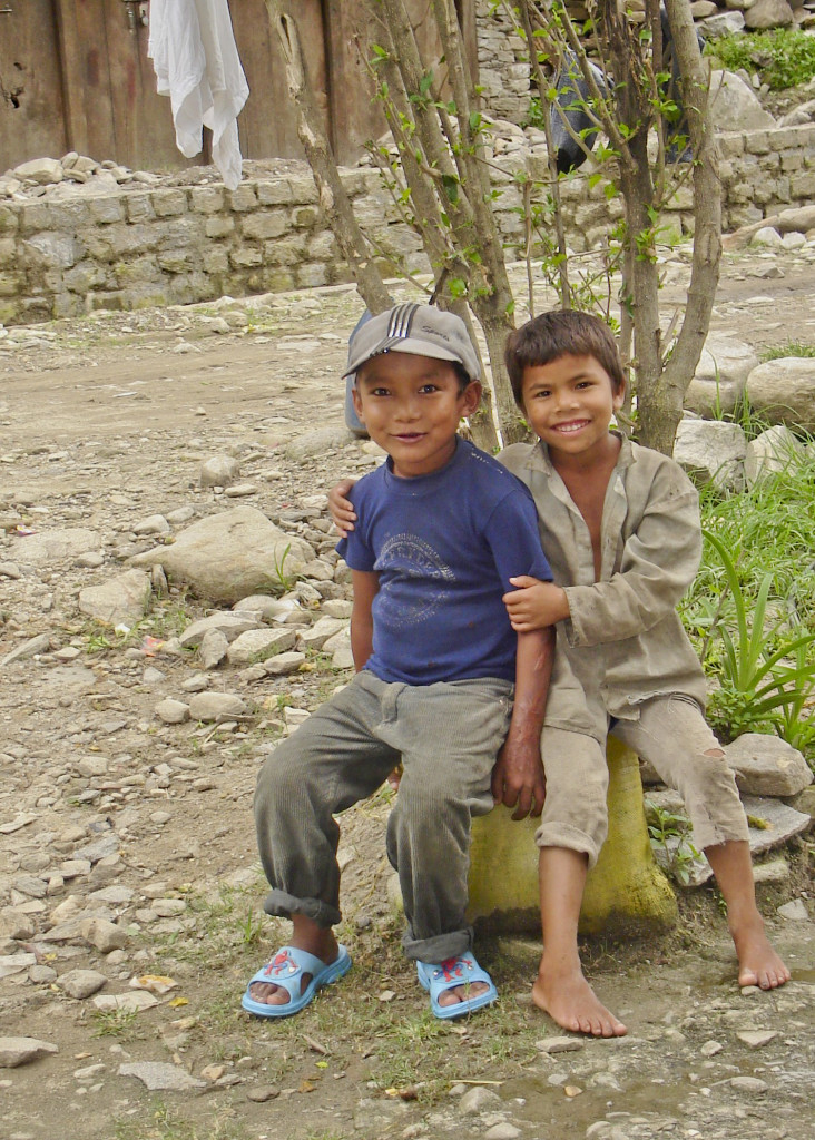Nrpalese friends - notice the scars on the left arm of the boy with the blue t-shirt.Such innocence and such a harsh life. Still these beautiful and pure smiles. Love their love...
